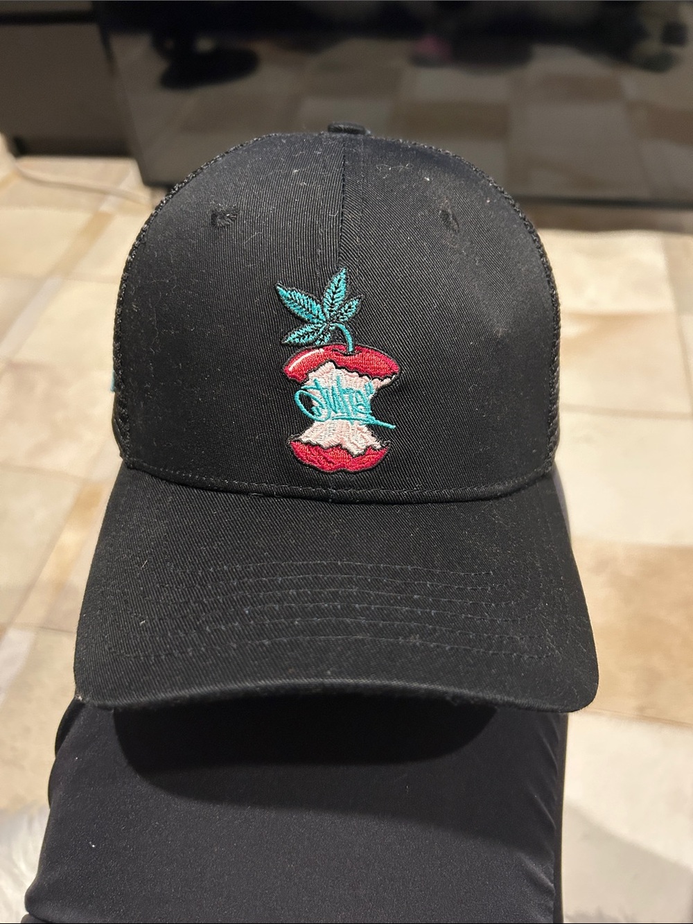 Black Trucker Hat with Red & Teal Apple Stitching